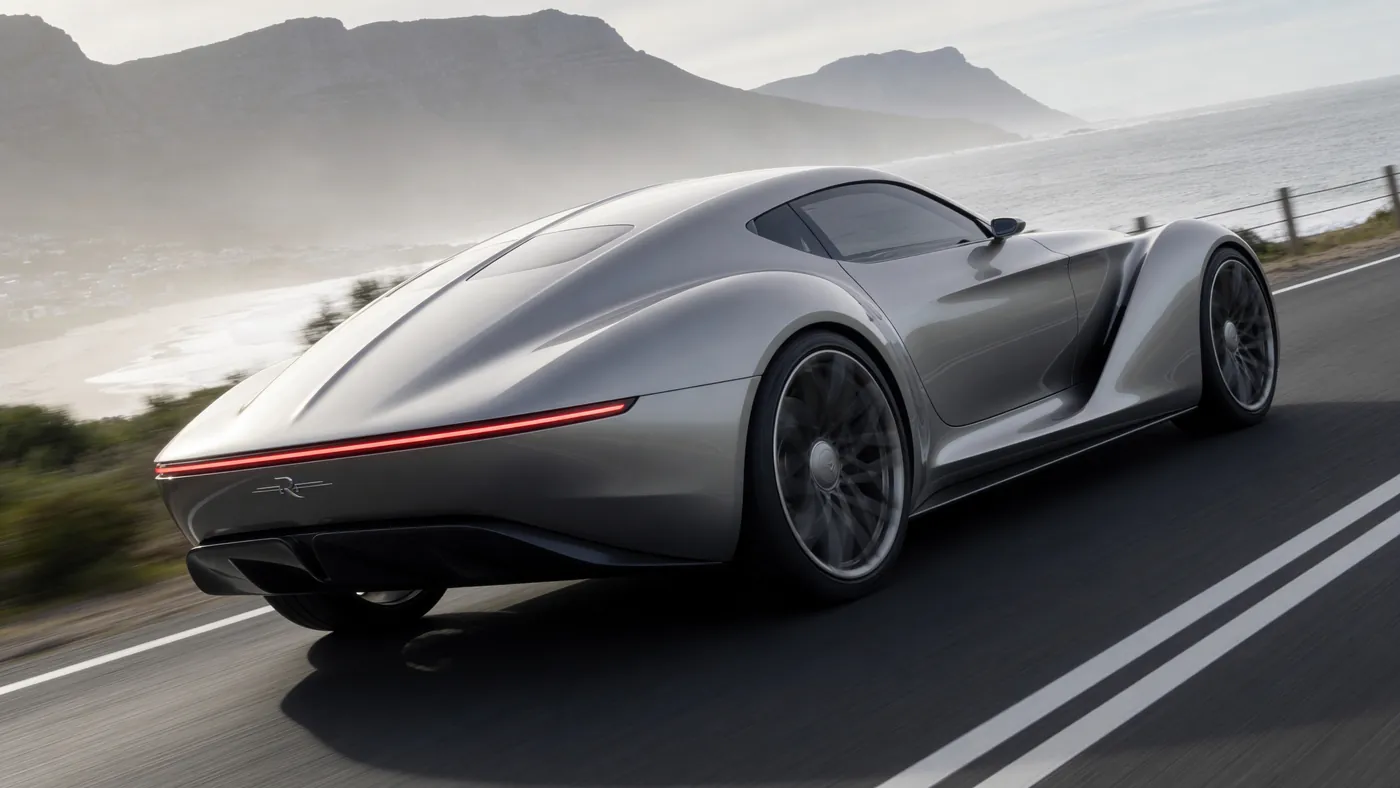 Mirage concept car in profile on a coastal road